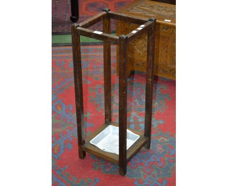 An oak stick stand circa 1940.