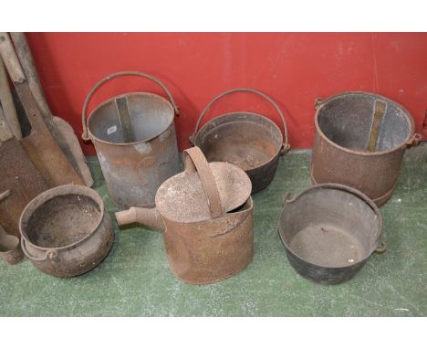 A vintage cast iron marmite cooking pot; two jam pans; two vintage buckets; a vintage watering can. (6)
