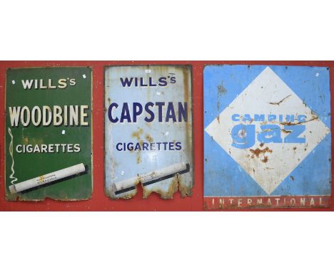 A Will's Woodbine Cigarettes enamel advertising sign; another similar; a Camping Gaz steel advertising sign (3).