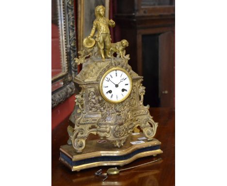 A Japy Freres cast gilt metal mantel clock, enamelled dial, Roman numerals, twin winding holes, pendulum and key.