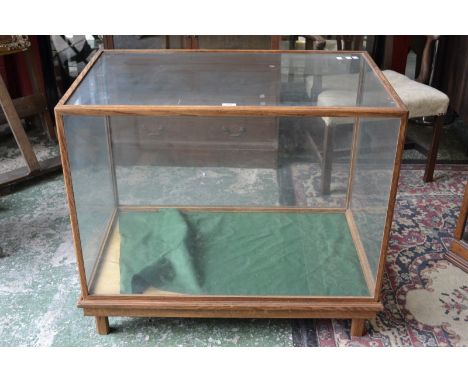 A five light oak display cabinet. 83cm high x 99cm x 61cm.