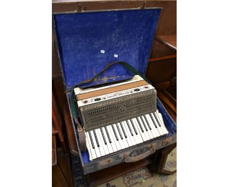 A Settimio Soprani accordion, cased.