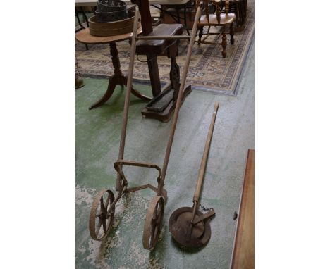 Vintage agricultural tools - a Cowers patent rotary seed drill; a furrow hoe. (2)