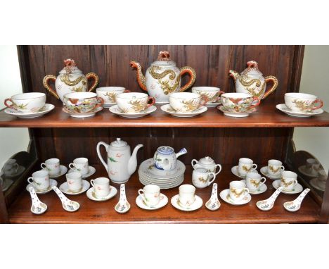 An Oriental eggshell tea service with Geisha girl face lithophane; another;etc 