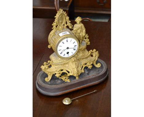 A gilt metal mantel drum clock, movement marked VR Brevete, Paris.