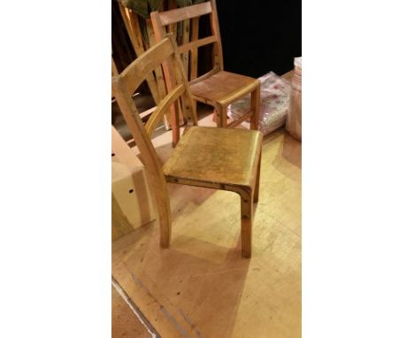 Pair of vintage wooden child's chairs each with original metal bracket supports