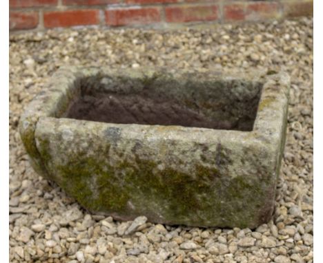 A SMALL HAND CARVED LIMESTONE RECTANGULAR TROUGH 57cm wide x 40cm deep x 23cm high 