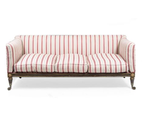 A REGENCY LARGE COUNTRY HOUSE SOFA upholstered in cream ground blue and red striped material with swab cushion and standing o