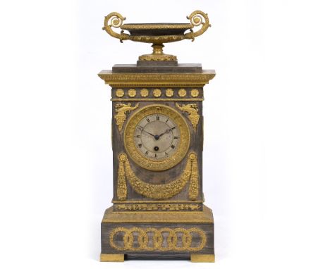 A 19TH CENTURY STEEL AND ORMOLU CASE MANTLE CLOCK OR TIMEPIECE the architectural case of plinth form surmounted by a shallow 