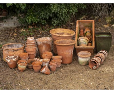 A SELECTION OF TERRACOTTA POTS and a square green planter and one other to include varying sizes and styles (a quantity)