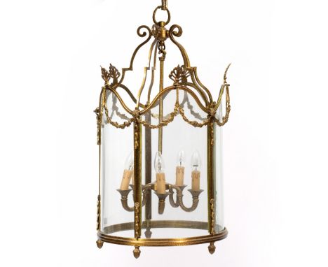 A GEORGE III STYLE CYLINDRICAL GILT METAL HALL LANTERN with classical decoration and central five light fitting, 40cm diamete