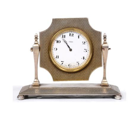 AN ART DECO SILVER EIGHT DAY TIMEPIECE by A. Buckley Ltd., with marks for Birmingham 1926, the Swiss made movement with an en