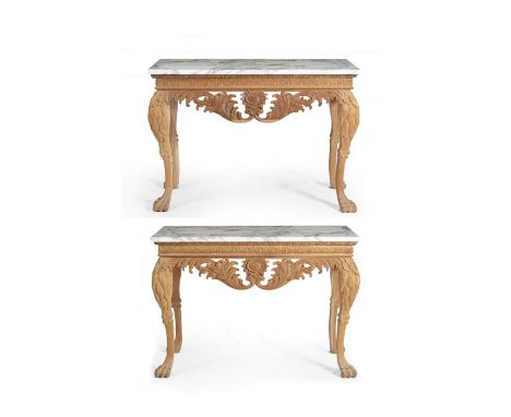 A PAIR OF GEORGE III STYLE RECTANGULAR MARBLE TOPPED CONSOLE TABLES  the frieze decorated with scrolling acanthus leaves and 