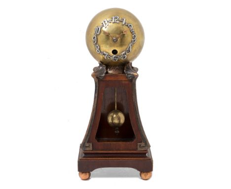AN EARLY 20TH CENTURY JUNGHANS ART NOUVEAU MANTLE TIMEPIECE OR CLOCK with hardwood case, the movement set within a brass sphe