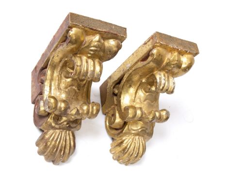 A PAIR OF ITALIAN CARVED PINE GILT WALL BRACKETS  of architectural scrolling form 10.5cm wide x 19cm deep x 22cm high (2)