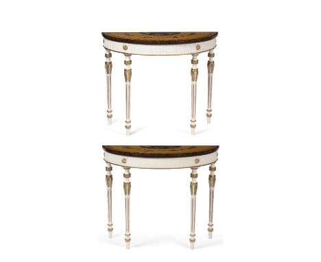 A PAIR OF GEORGIAN STYLE DEMI LUNE CONSOLE TABLES the satin wood veneered tops painted with ribbon tied swags of flowers, the