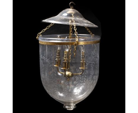 A REGENCY STYLE CUT GLASS HANGING LIGHT FITTING  of bowl form, the gilt metal ring suspension moulded with exotic birds heads