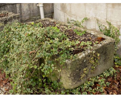 A LARGE RECTANGULAR STONE TROUGH 130cm long x 73cm deep x 37cm high