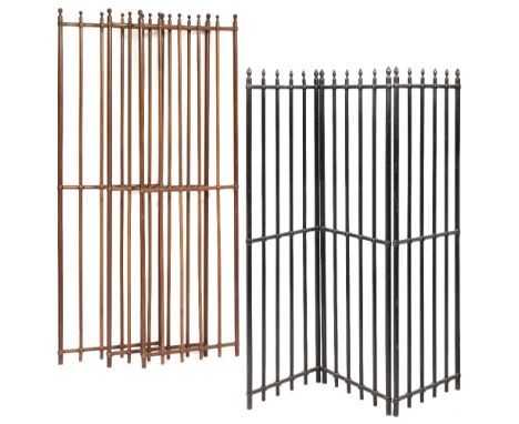 A 19TH CENTURY THREE FOLD EBONISED SCREEN OR ROOM DIVIDER in the form of a set of railings with turned pointed finials, each 