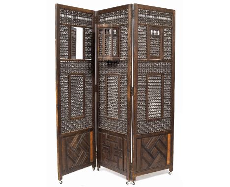 A MIDDLE EASTERN, POSSIBLY MOORISH, THREE FOLD BOBBIN TURNED SCREEN with hinged openings to each outer section and with a bow