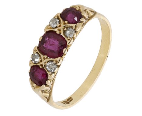 A ruby and diamond ring, set with three oval-cut rubies with old brilliant-cut diamond highlights between, stamped ‘18CT’, ri