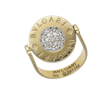 A diamond ring by Bulgari, the rotating circular panel set to the centre with a disc of brilliant-cut diamonds, signed, numbe