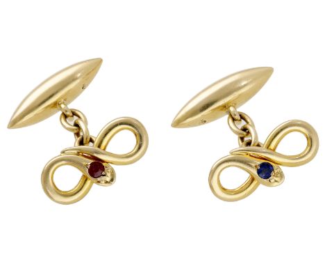 A pair of gold serpent cufflinks, each modelled as an entwined serpent with either a sapphire or ruby highlight, with chain c