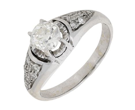 A diamond dress ring, set with an old brilliant-cut diamond between bombé shoulders set with similarly-cut diamonds, partial 