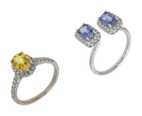 Two sapphire and diamond rings, the first set with an oval-cut yellow sapphire within a surround of brilliant-cut diamonds, m