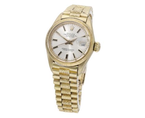 Rolex. A lady’s gold automatic wristwatch with date and bracelet, Ref. 6927, Oyster Perpetual, Datejust, circa 1980. Movement