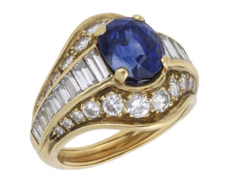 A sapphire and diamond dress ring, the bombé style mount vari-set throughout with graduated brilliant and baguette-cut diamon