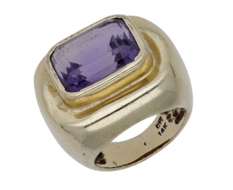 An amethyst dress ring, the step-cut amethyst collet set to a broadly tapered band, stamped ‘14K’, ring size approximately J.