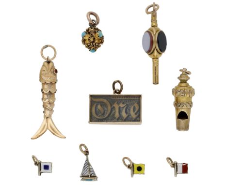An assortment of charms, to include a 19th century turquoise-set boule, a 19th century watch key fob with hardstone panels, a