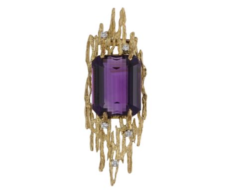 An amethyst and diamond brooch, circa 1970, the step-cut amethyst set within a textured linear setting with diamond highlight