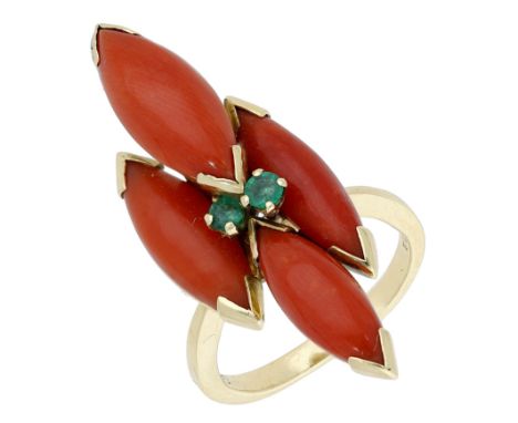 An 18ct gold coral and emerald dress ring by Andrew Grima, 1969, the tiered lozenge-shaped Corallium Rubrum cabochons with ci