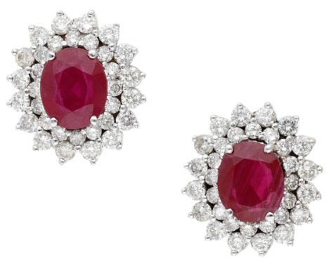 A pair of synthetic ruby and diamond cluster earrings, the oval-cut synthetic rubies within a surround of brilliant-cut diamo