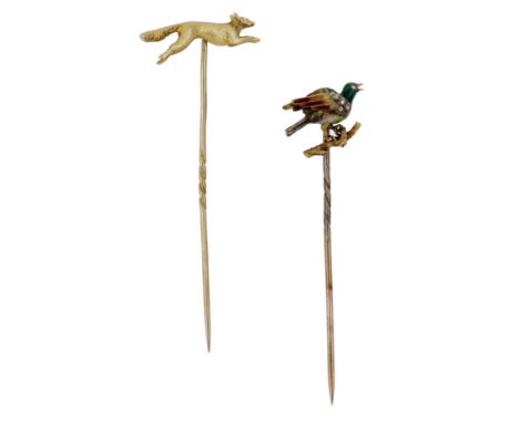 Two antique stick pins, the first designed as a running fox, the second as a polychrome enamel bird on a branch, with rose-cu