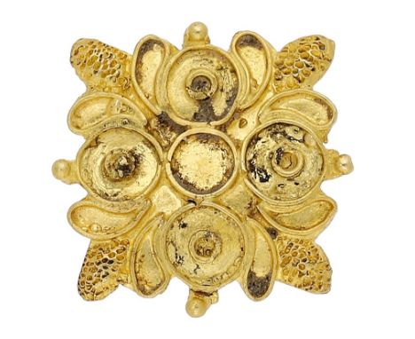 An Elizabethan gold button, 16th century, of flattened square shape with a floral motif, ornamented to the front with four ci