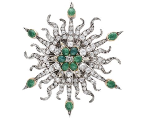An enamel and diamond starburst brooch, of radiating design, set throughout with old brilliant-cut diamonds and with green en