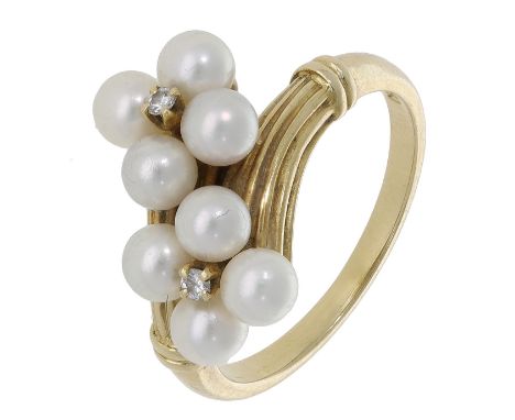 A cultured pearl and diamond ring by Mikimoto, of crossover cluster design, the brilliant-cut diamond and cultured pearl clus