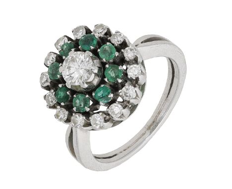 An emerald and diamond cluster ring, of target design, set with brilliant and single-cut diamonds and circular-cut emeralds, 