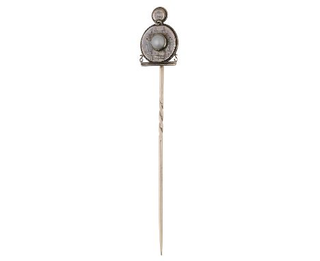 Of railway and engineering interest: A 19th century gold stick pin, set with a half-pearl beneath a circular surmount engrave
