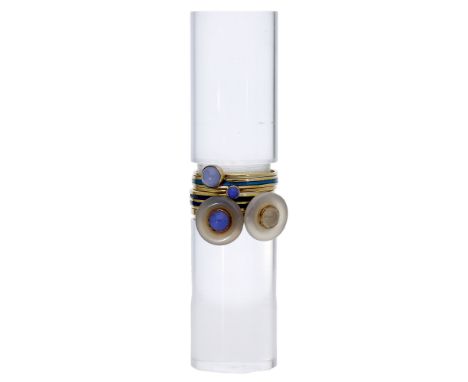 A set of six stacking rings by Wendy Ramshaw, circa 1970 onwards, comprising two chalcedony disc rings with cabochon centres,