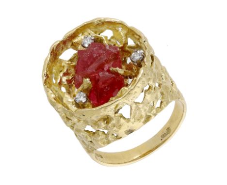 An 18ct gold spinel and diamond ‘Crown’ ring by John Donald, 1967, of textured, abstract design, the pierced mount with an op