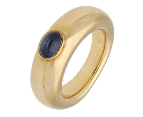An 18ct gold and sapphire ring by Chaumet, the tapered mount of bombé form and collet-set with a sapphire cabochon, signed ‘C