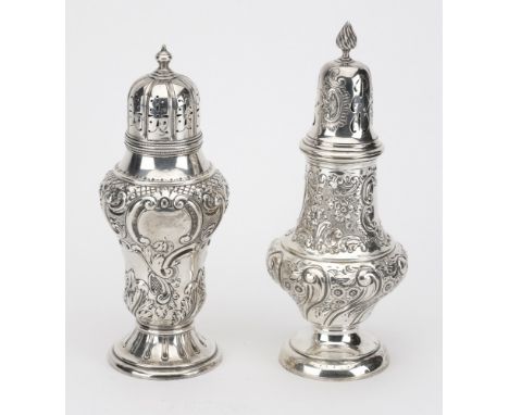 Two Victoria silver sugar casters, of generous size, both of baluster form and repoussé decorated with ‘C’ scrolls and flower