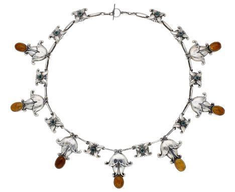 A silver, amber and chrysoprase necklace, design No. 8, by Georg Jensen, 1904-1908, designed as a series of stylised flowerhe