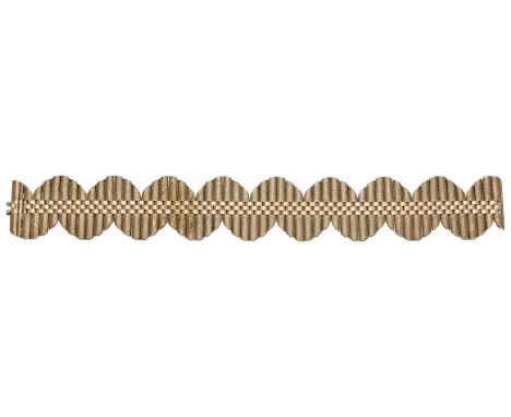 A 9ct gold track-link bracelet, of undulating outline, the bracelet composed of polished and textured links, maker’s mark ‘JG
