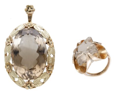 Two smoky quartz jewels, comprising a brooch / pendant set with an oval-cut quartz in a bicoloured foliate surround, and a ri