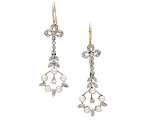 A pair of diamond and pearl ear pendants, circa 1910, with diamond bow surmounts, diamond foliate detailing and terminating i